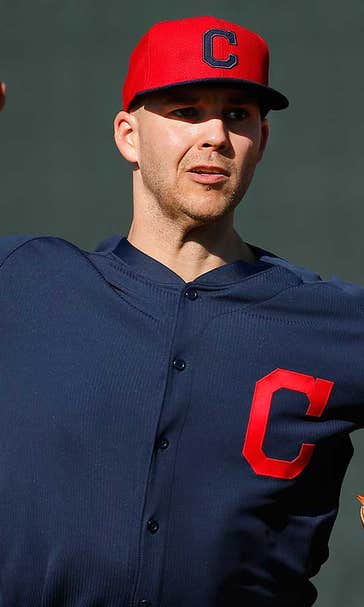 Santana makes debut at 3B, Indians beat Reds 12-3
